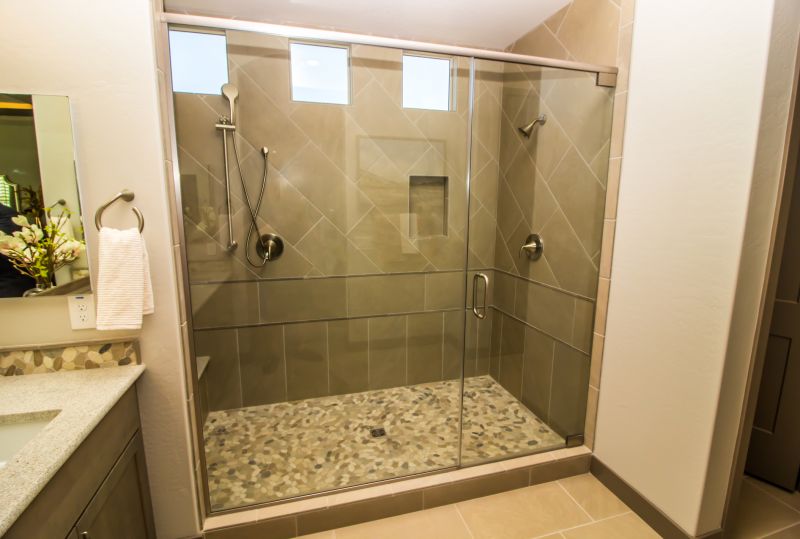 Shower with Frameless Glass and Modern Fixtures